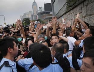 Tensions rise in HK as government tells protesters to disperse