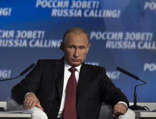 Putin says foolish sanctions will not hold back Russia