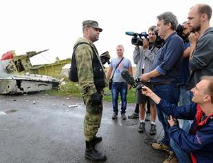 Ukraine says Russia helping destroy crash evidence