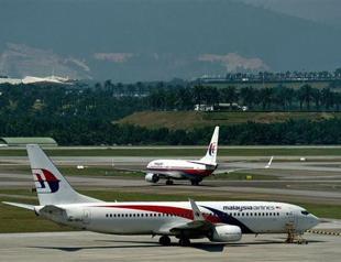 Malaysia Airlines to refund cancellations after MH17