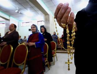 Jihadists claim Baghdad blasts as Iraq rallies behind Christians