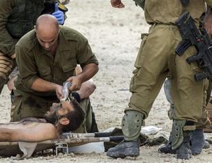 Israel army: 13 soldiers killed overnight in Gaza