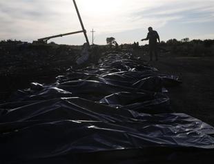 Rescuers find 251 bodies at MH17 crash site