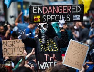 100 arrested at Wall Street climate crisis sit-in