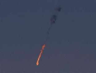 Israel to react forcefully to threats after Syria jet downed