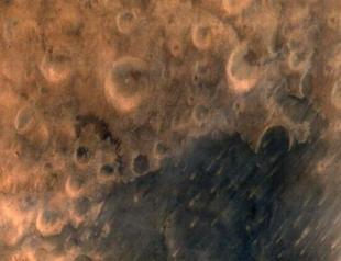 Indias spacecraft beams back first Mars photos
