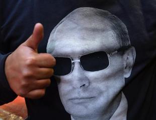 Putin celebrates Herculean birthday