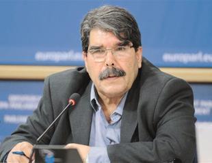 Kobane gets first Turkish aid as Syrian Kurds plead for corridor