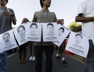 New mass graves found in missing Mexican students case