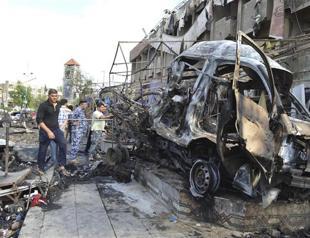 Car bombs kill at least 18 in Baghdad Shiite area