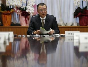 Japan PMs new minister hit by scandal over racy bar bill