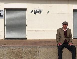 Banksys offensive mural painted over in British town