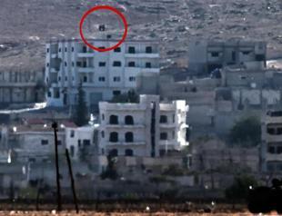 ISIL raises flag in eastern Kobane, Kurds say town has not fallen