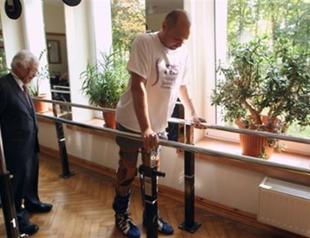 Paralysed man walks again after breakthrough treatment