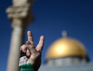 Israeli troops clash with Palestinian protesters over holy site