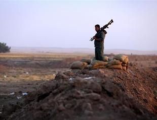 Syrian Kurds press hundreds of young men into army