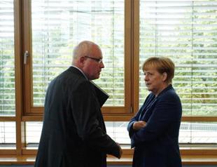 Merkel ally leaves option open of arming PKK