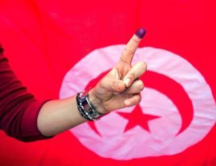 Tunisia awaits results as secular party claims win