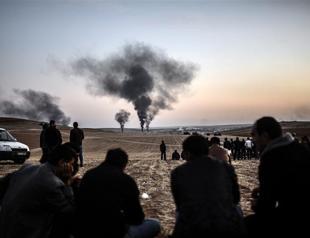 Syria says it is supplying military aid to Kurds to fight ISIL