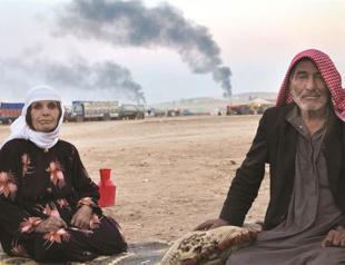 Families left in Kobane gasping for life under bullets and bombs