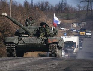 Ukraine accuses Russia of sending dozens of tanks