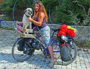 IN PHOTOS: Scottish cyclist interrupts world tour to save stray dog