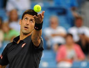 Djokovic outlasts Simon to advance at Cincinnati