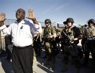 Tear gas fired at protesters after US teens death