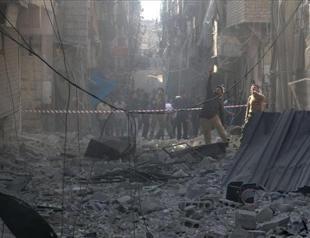 Syria escalates barrel bomb attacks as world attention shifts
