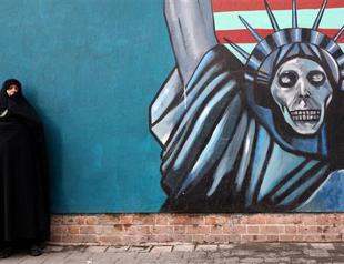 Flag-burning Iranians mark fall of US embassy