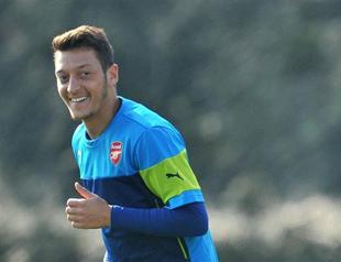 Özil settles case with father out of court