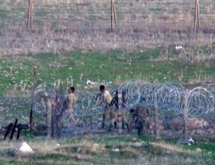 Turkish soldiers retaliate against stone-throwing children in kind