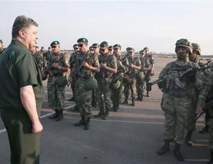 Poroshenko says Ukraine to stay united, sees special status for rebel-held areas