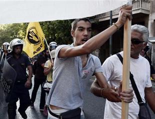 Greece toughens anti-racism law after long debate