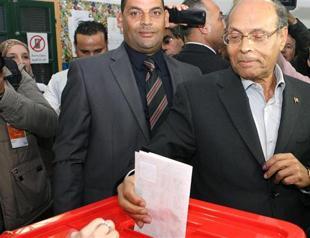 Tunisia presidential runoff likely after historic vote