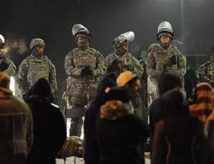 Passions still inflamed but Ferguson starts to calm