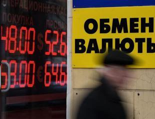 Ruble turns back down, hitting new low of 54.82 to dollar