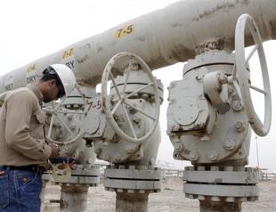 IEA revises world oil demand growth sharply lower