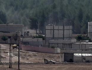 Syrian Kurds get arms from Iraq, but cannot send them to Kobane