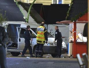 Ten injured as attacker rams van into French Christmas market