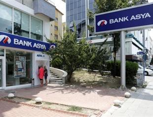 Bank Asya shares tumble on return to trading