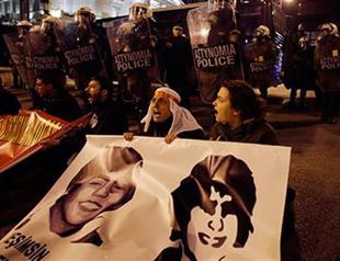 Greece bans protests amid Turkish PM’s visit as teen killed by police commemorated