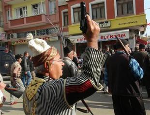 Veterans fire guns into air in southeastern Kilis during liberation day celebrations
