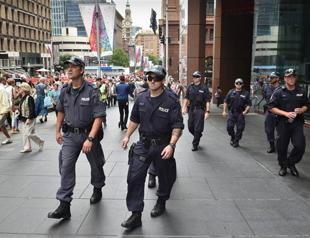 Australian PM says cafe siege horrific wake-up call