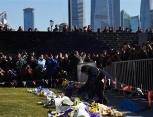 Shanghai New Years Eve stampede kills 36 after fake money thrown from building