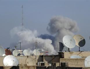 US-led coalition jets pound ISIL stronghold in Syria