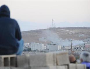 Stray mortar shells injure three in Turkish border town