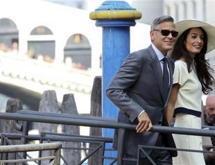 Mrs Clooney outshines new hubby as wedding made official