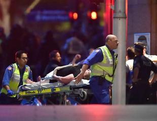 Gunman, two hostages killed as police storm Sydney siege cafe