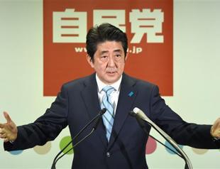 Abe pledges Japan constitution rewrite after election win